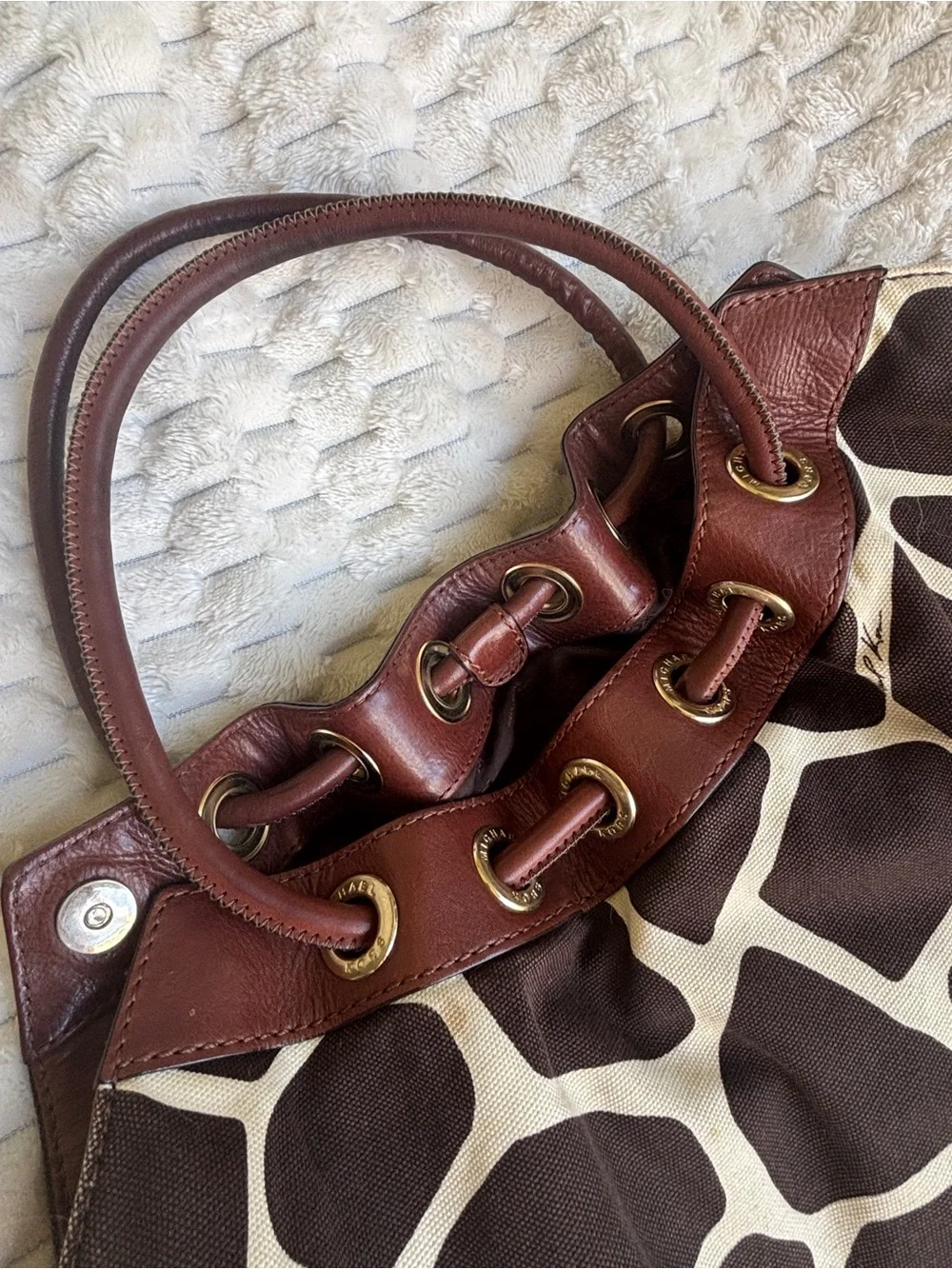 Michael Kors giraffe print canvas, leather trim designer, Gromit detail